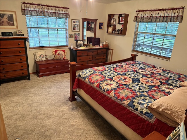 bedroom with light carpet