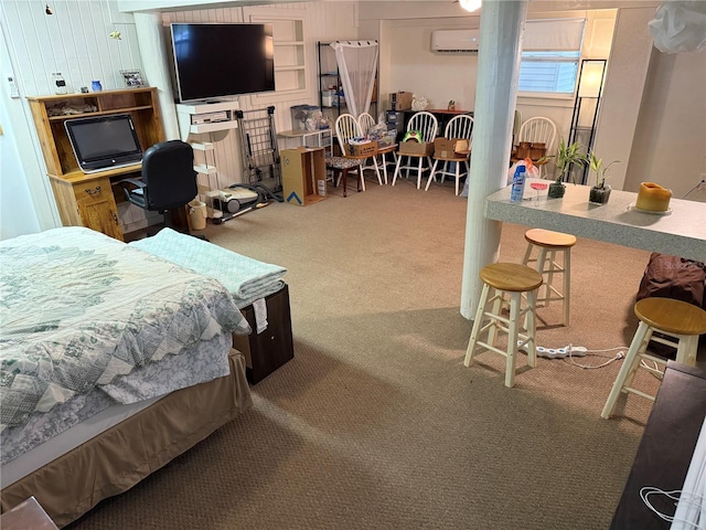 carpeted bedroom with a wall mounted air conditioner