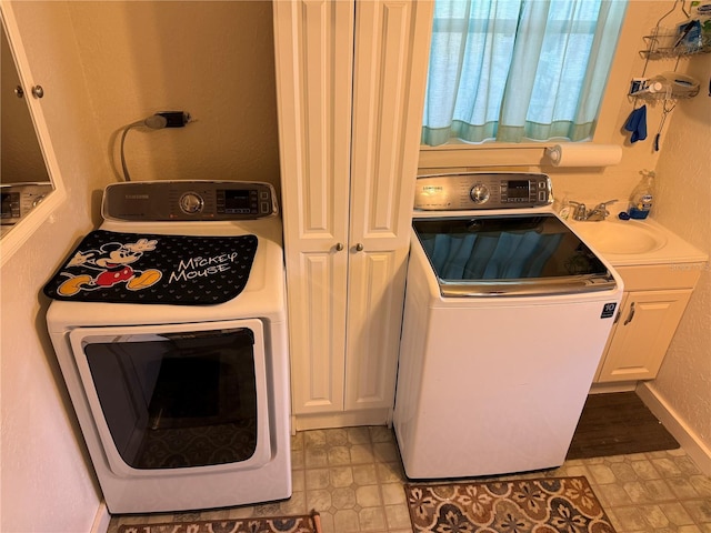 washroom with cabinets and sink