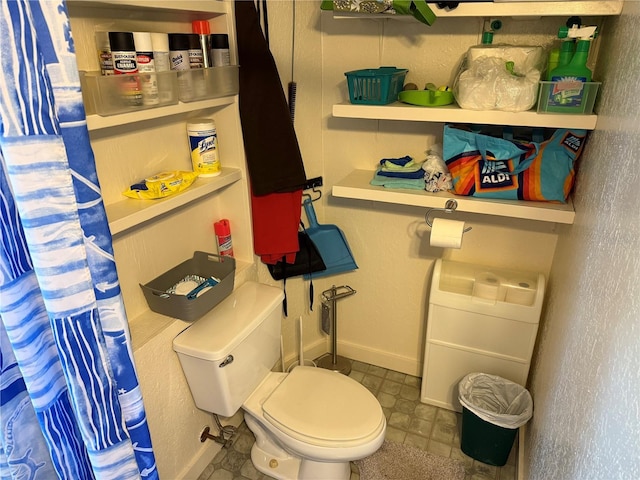 bathroom featuring toilet