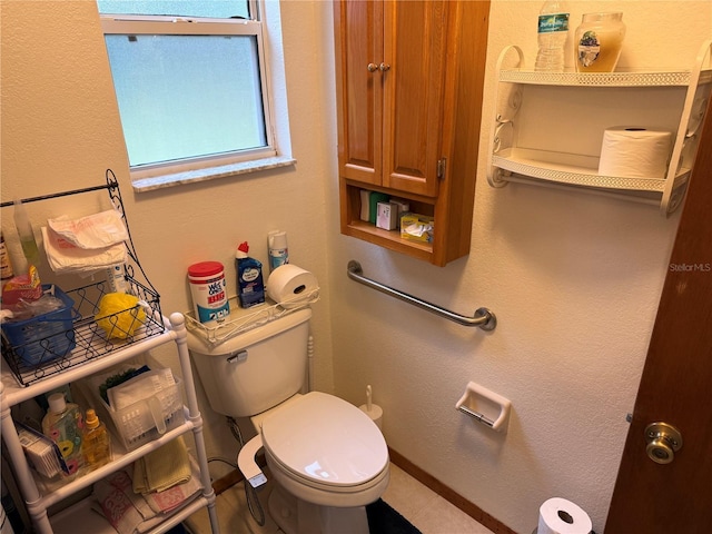 bathroom featuring toilet