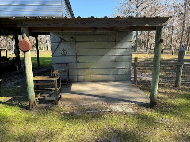 view of outdoor structure featuring a yard