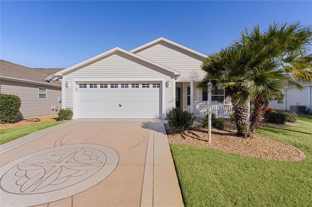 single story home featuring cooling unit, a garage, a front lawn, and covered porch