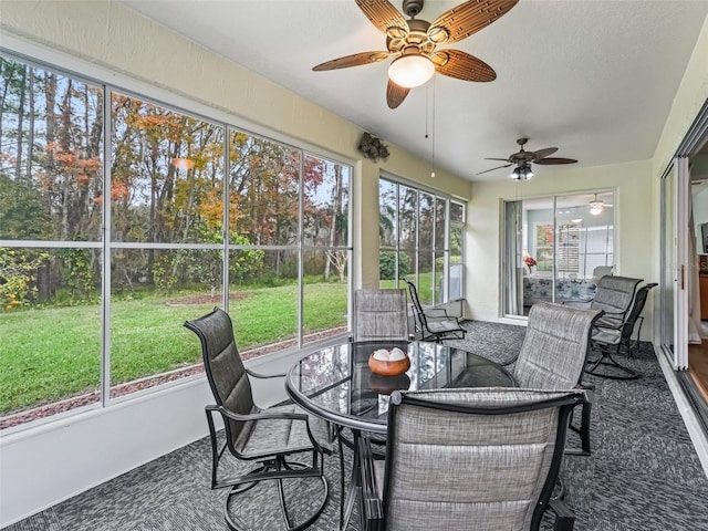 sunroom featuring a healthy amount of sunlight