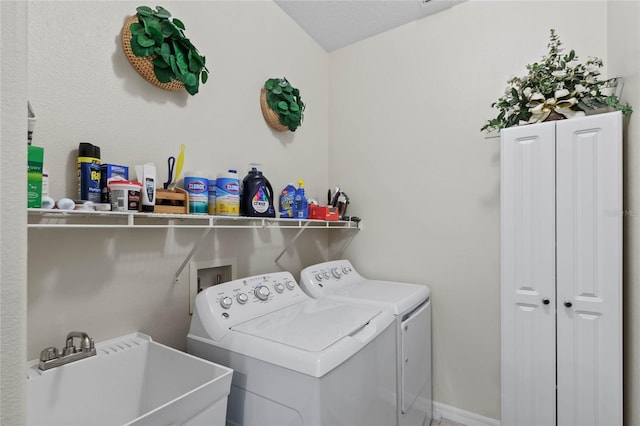 laundry room featuring sink and independent washer and dryer