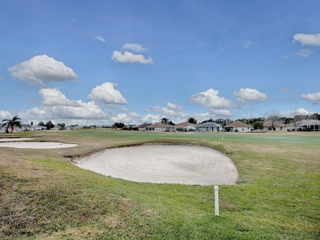 view of community featuring a lawn