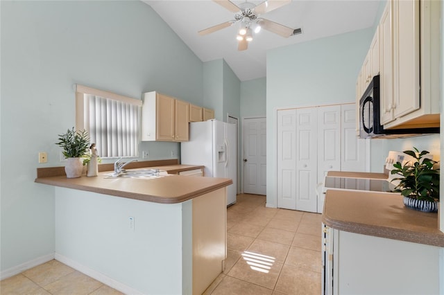 kitchen featuring sink, light tile patterned floors, kitchen peninsula, high vaulted ceiling, and white refrigerator with ice dispenser