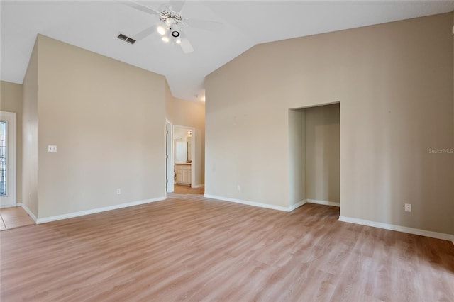 unfurnished living room with ceiling fan, vaulted ceiling, and light hardwood / wood-style flooring