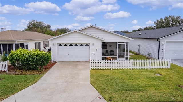 ranch-style house featuring a garage, a front lawn, and a sunroom