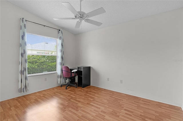 424 Rose Croft Ter, The Villages, FL 32162 - unfurnished office featuring wood finished floors, a textured ceiling, and a ceiling fan