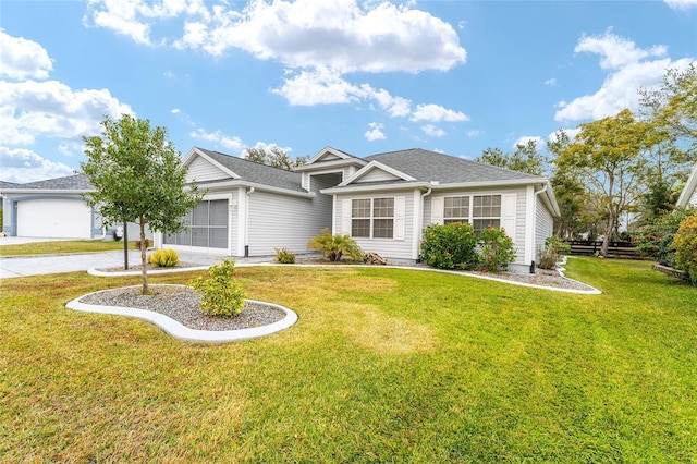 single story home featuring a garage and a front yard