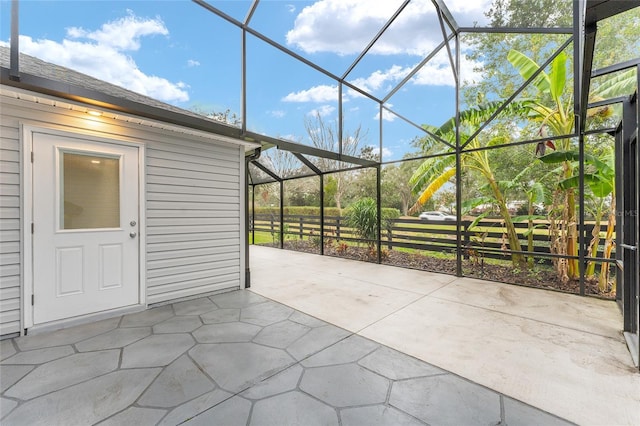 view of patio / terrace with glass enclosure