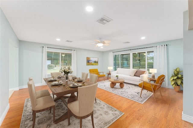 interior space with ceiling fan and light hardwood / wood-style flooring