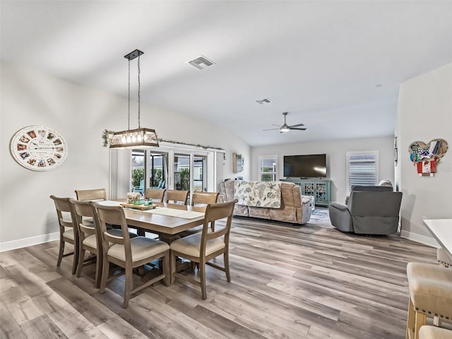 dining room featuring ceiling fan and light hardwood / wood-style flooring