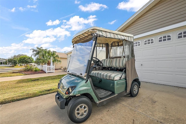 view of parking with a yard