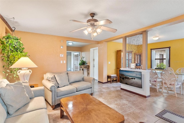 living room featuring ceiling fan