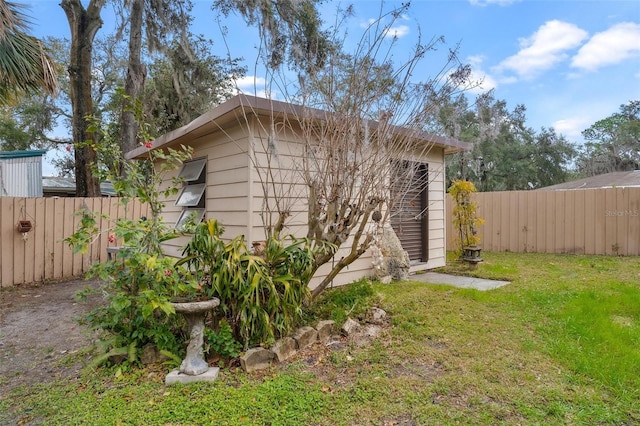 view of outdoor structure featuring a yard