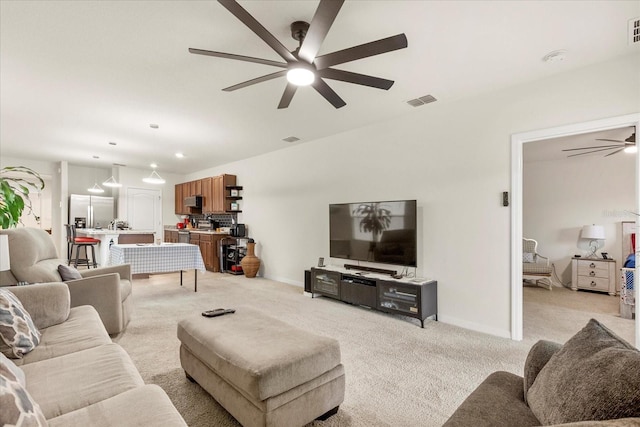 living room featuring light colored carpet