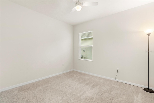 unfurnished room featuring carpet floors and ceiling fan