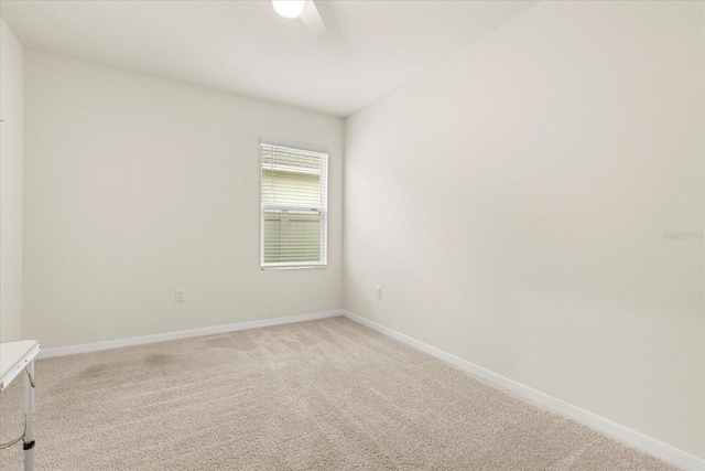 empty room with light colored carpet