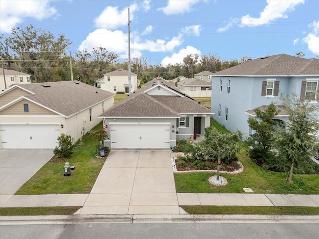 view of front facade with a front lawn and a garage