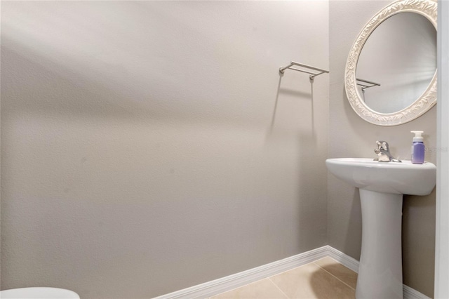 bathroom featuring tile patterned flooring