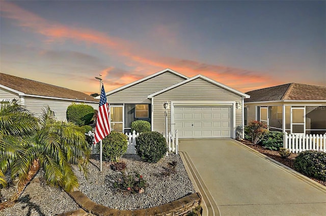 view of front of home with a garage