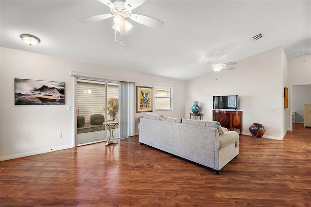 living room featuring ceiling fan, dark hardwood / wood-style flooring, and lofted ceiling