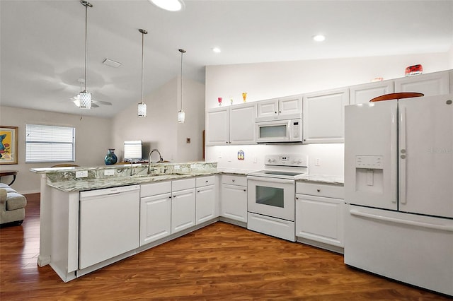 kitchen featuring white appliances, pendant lighting, lofted ceiling, white cabinetry, and sink