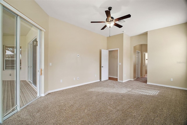 spare room featuring ceiling fan and light carpet