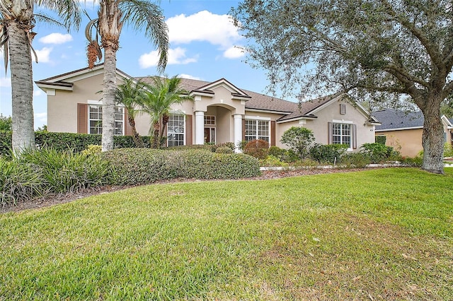 view of front of home featuring a front lawn