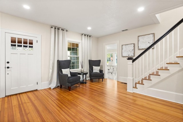 entryway with light hardwood / wood-style flooring