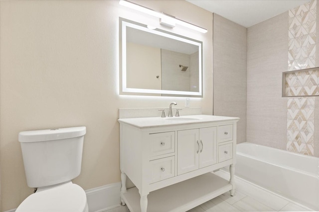 full bathroom featuring tiled shower / bath combo, vanity, and toilet