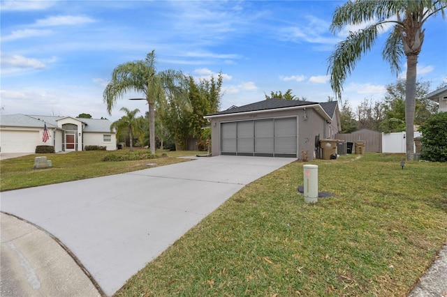 single story home with a front lawn and a garage