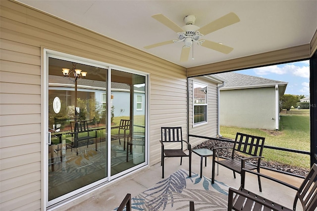 exterior space with ceiling fan