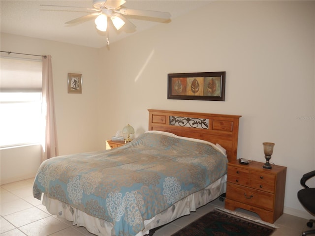 bedroom featuring ceiling fan and light tile patterned floors