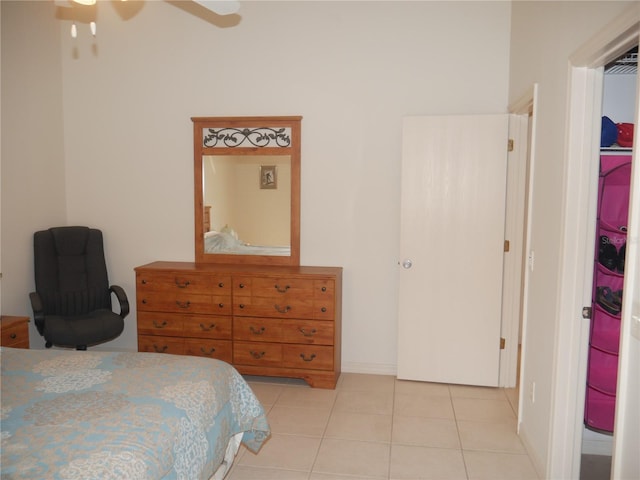 bedroom featuring ceiling fan and light tile patterned floors