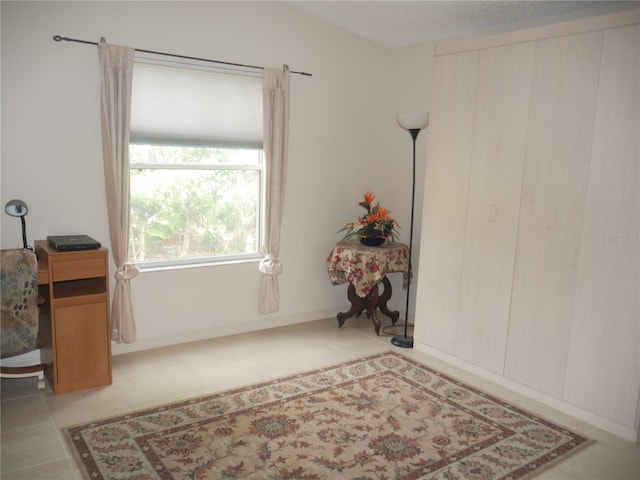 interior space featuring light tile patterned floors