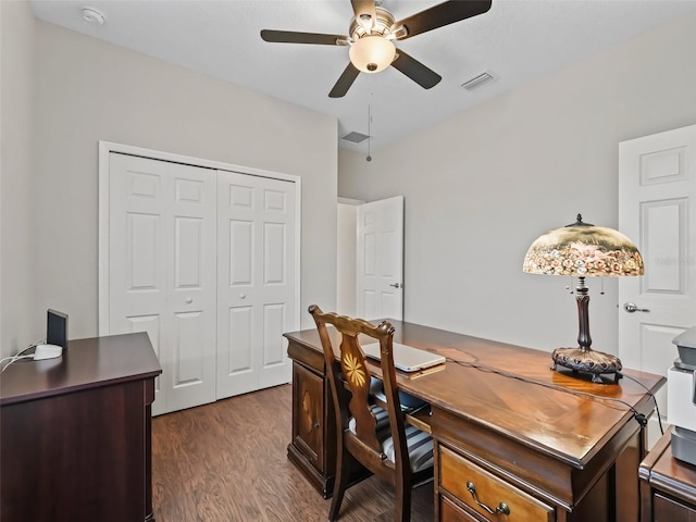 office space featuring ceiling fan and dark hardwood / wood-style flooring