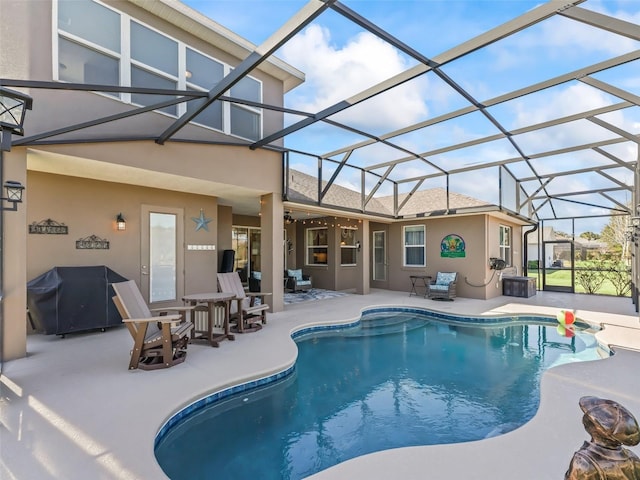 view of pool featuring a lanai and a patio