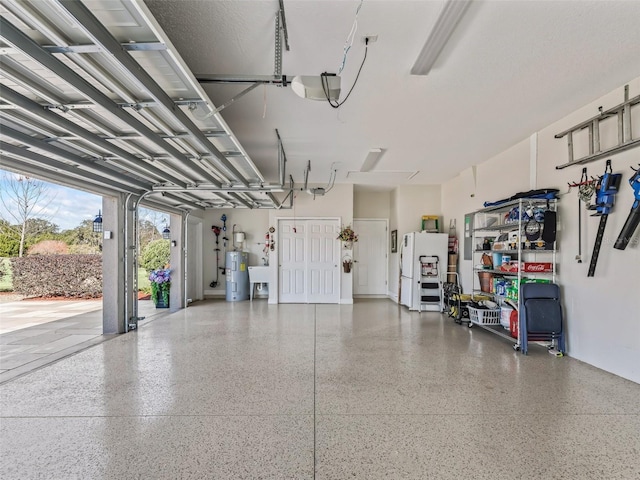 garage featuring water heater, a garage door opener, and white refrigerator