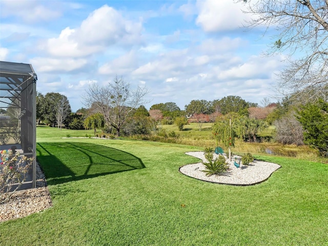 view of yard featuring a lanai