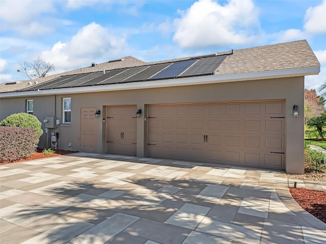 garage with solar panels