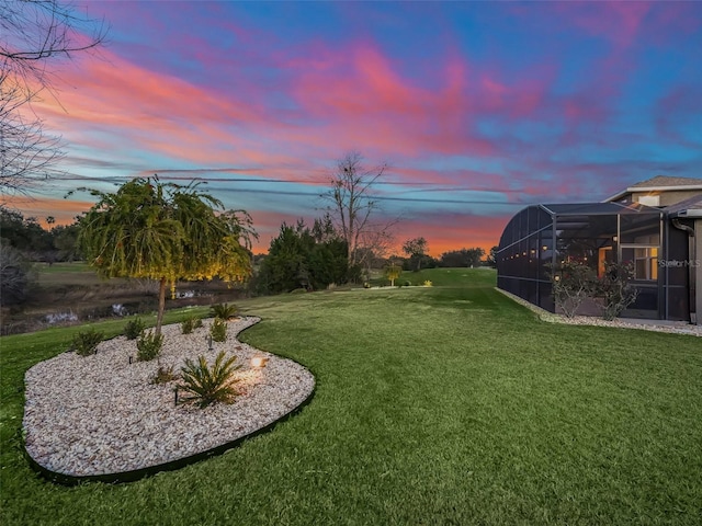 yard at dusk with glass enclosure