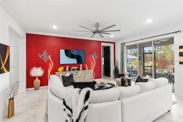 living room featuring ornamental molding and ceiling fan