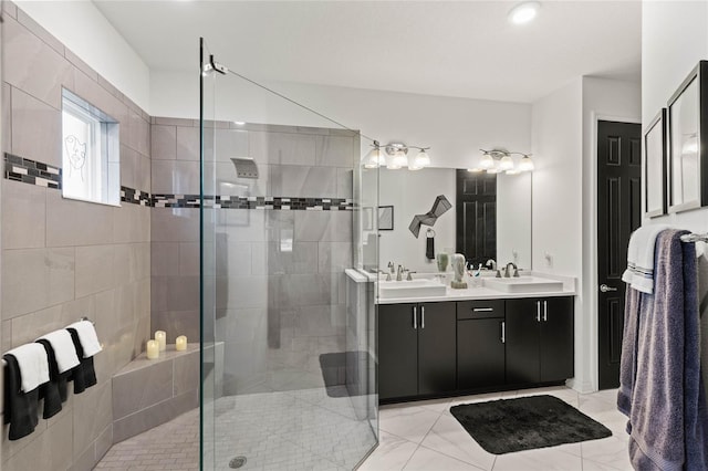 bathroom with vanity and a shower with shower door