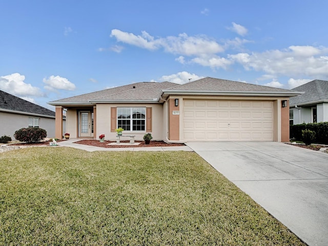 ranch-style home featuring a front yard and a garage