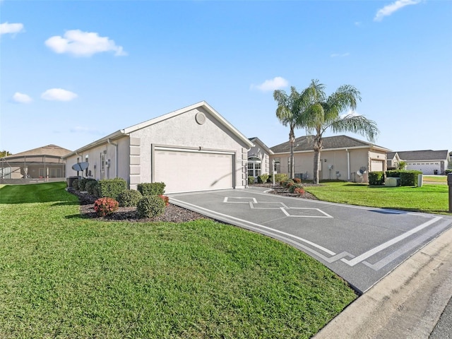 ranch-style house with a front lawn and a garage