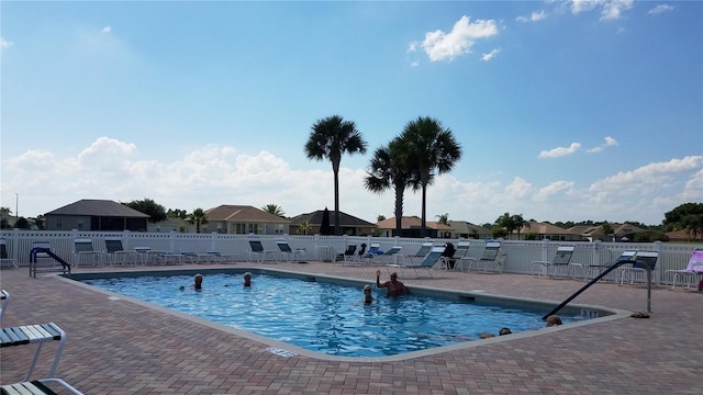 view of swimming pool featuring a patio area