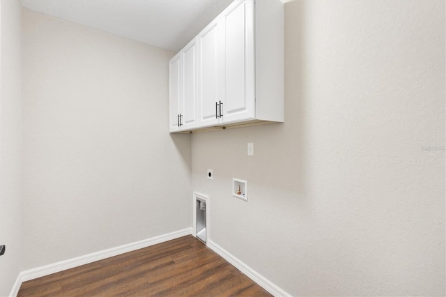 laundry area with washer hookup, cabinets, dark hardwood / wood-style floors, and hookup for an electric dryer